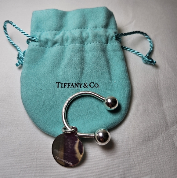 Tiffany & Co. Accessories - Tiffany & Co. Silver Round Tag Key Ring With Pouch